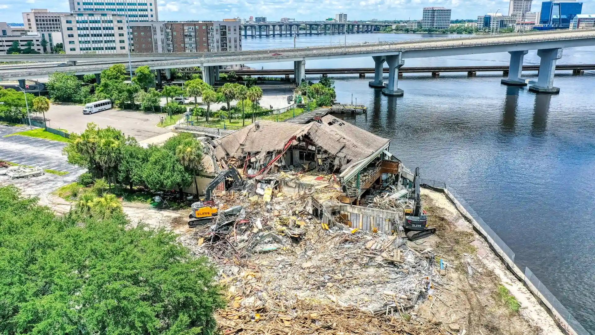 Aerial view of ELEV8 excavators demolishing the former River City Brewing Company building on the Southbank riverfront in Jacksonville